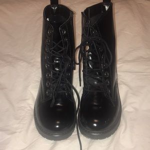 Shiny combat boots
